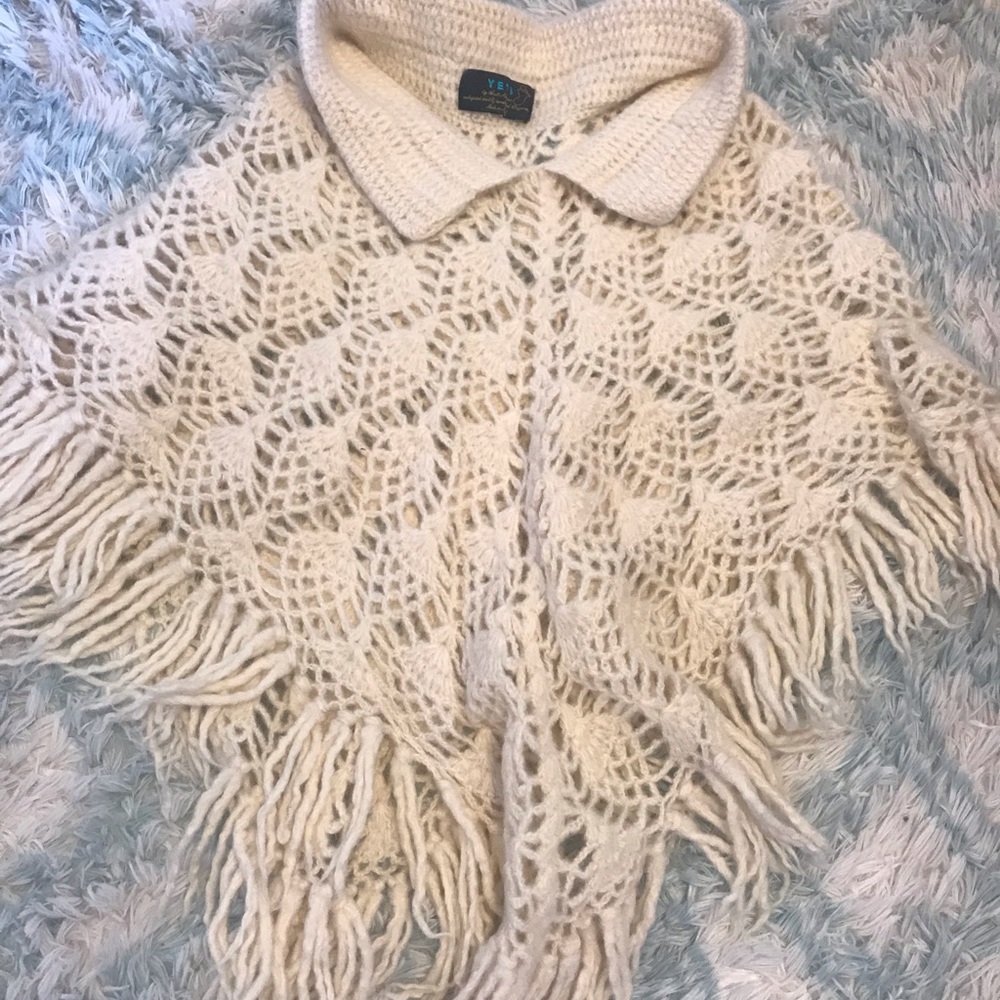 V E T I Poncho